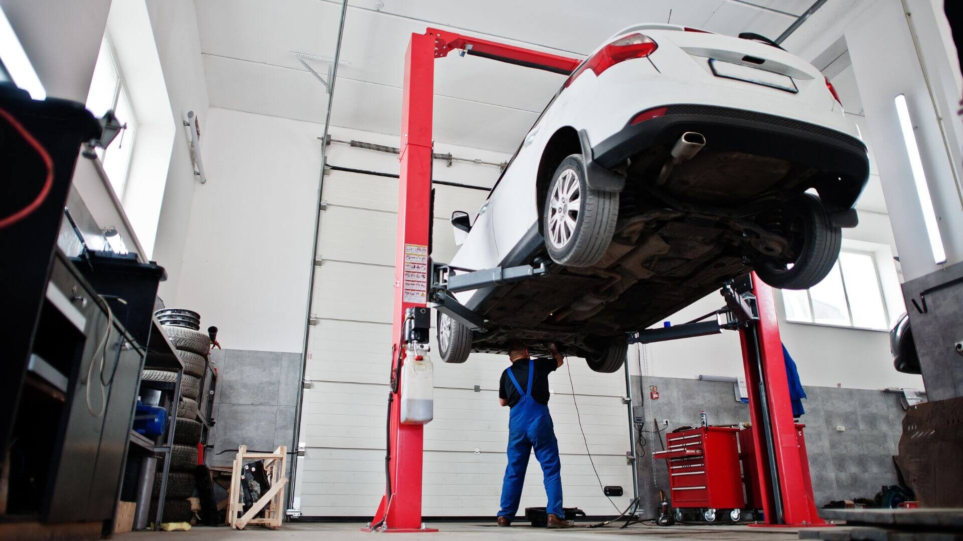 Car Suspension Being Repaired In Garland Auto Body Shop