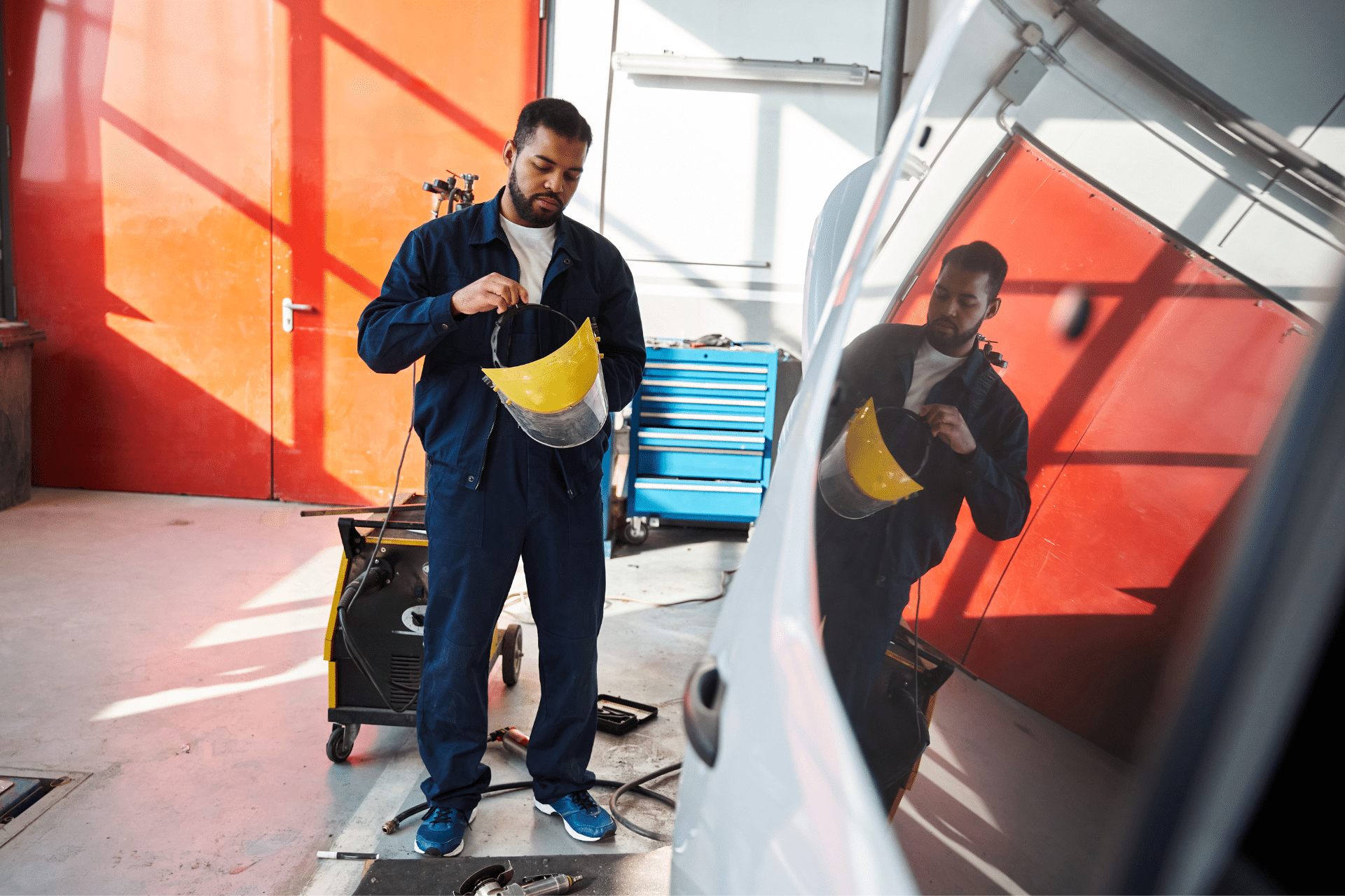 Mr. Car Shine Mechanic Working On Body Repairs