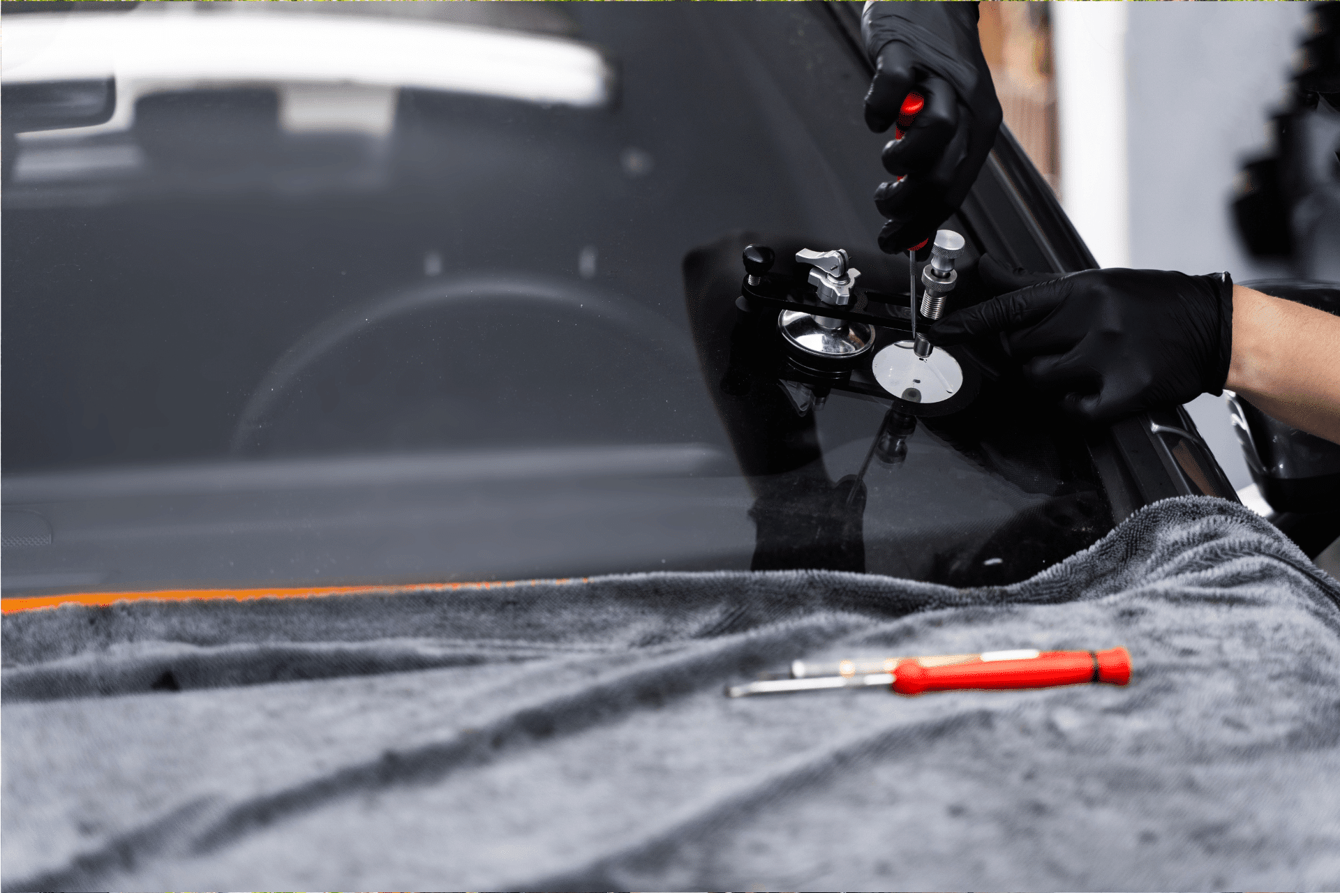 Car In Garland Receiving Windshield Repairs By The Experts At Mr. Car Shine